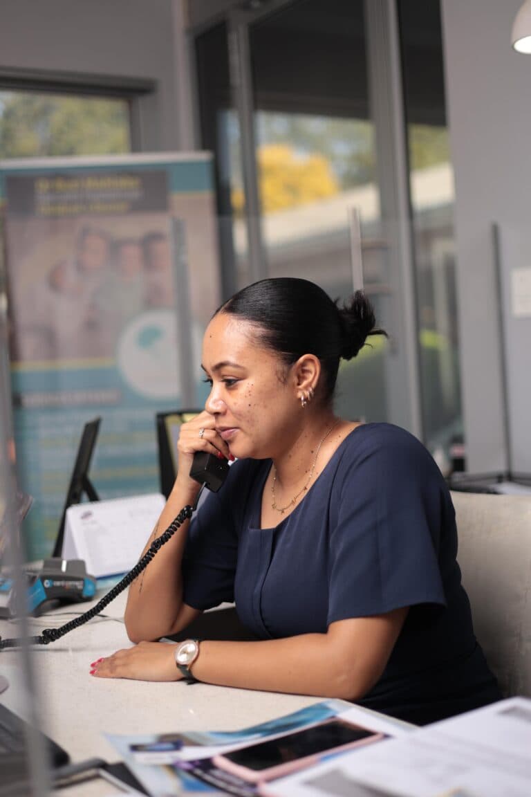 Staff member on the phone in office